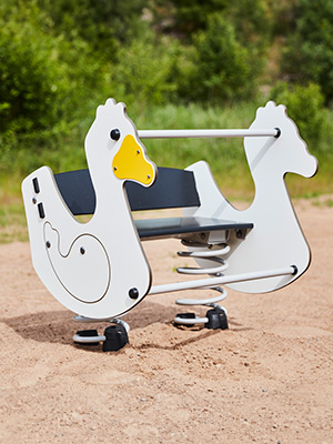 A white duck themed spring toy for the playground.